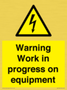 warning-work-in-progress-on-equipmentwith-electrical-hazard-symbol~